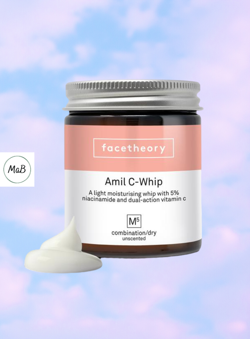 A photo of a jar of Facetheory Amil C Whip moisturiser. The background of the image is a purple and pink sky.
